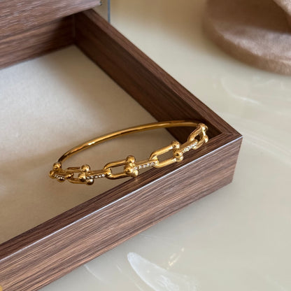 Solis Horseshoe Bangle